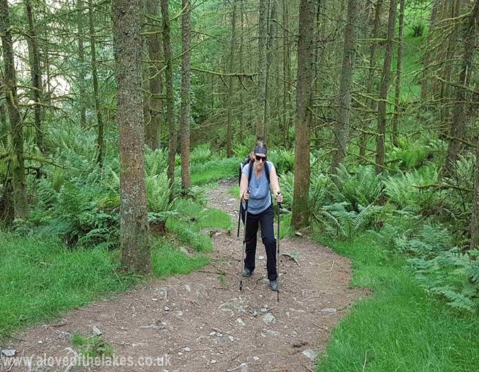 Sue climbing up the steep path