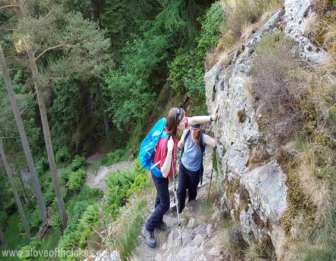 Climbing the rock outcrop