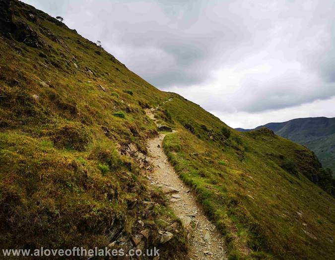 The path climbs the West flank of Birks