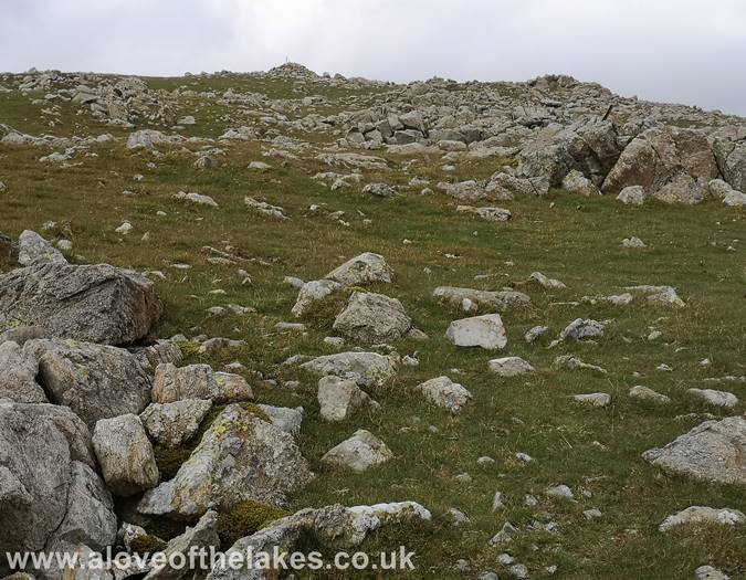 The summit cairn comes into view