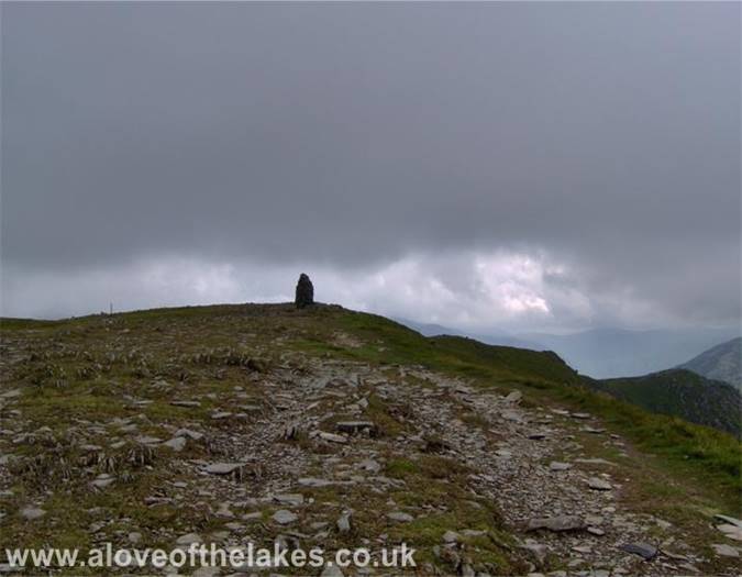 Approaching the summit cairn on High Spy