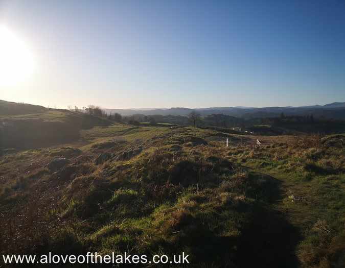 The track passes a number of sheep pens