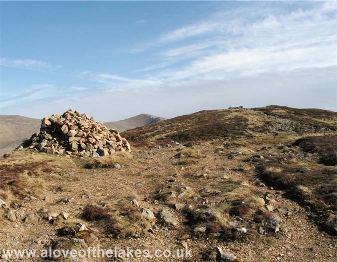 The two summit cairns